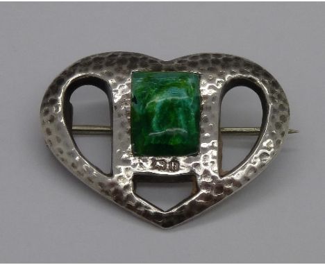 An Edward VII Art Nouveau silver and enamel heart shaped brooch, hallmarked on the front and back, Birmingham 1907, by C.V. &