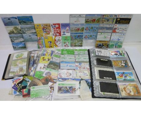 A collection of phone cards, some vintage