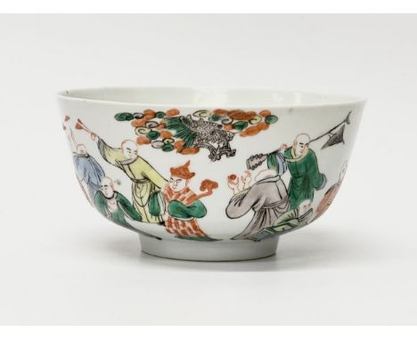 A Chinese, Late Qing Dynasty footed bowl. Kangxi Revival and 6 character mark. 19th Century. depicting Luohan‘s and tigers. 1