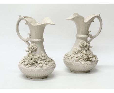 A pair of Late 19th Century Belleek Pottery ewers. 2nd Period. C.1891. 23cm
