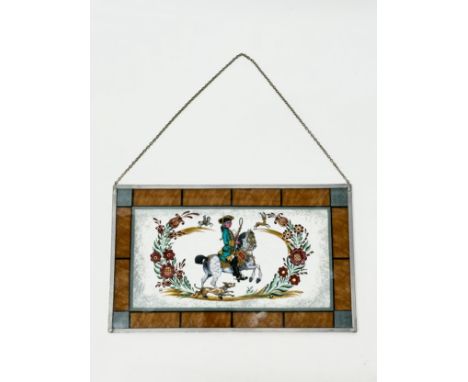 A 20th Century painted stained glass panel. 31.5x19cm.