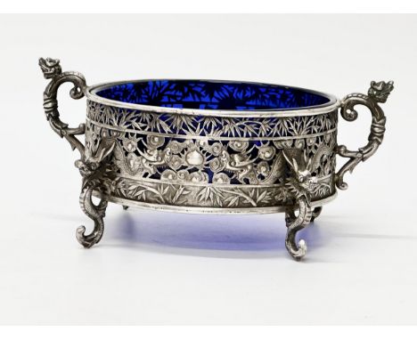 Wang Hing. A Chinese Export silver bowl. Late 19th/Early 20th Century. Pierced bowl with original cobalt blue glass liner. Ra