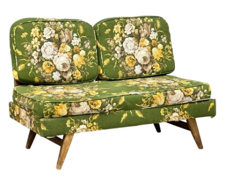 A 1950’s Mid Century daybed sofa. With original flower upholstery. 123x65x88cm