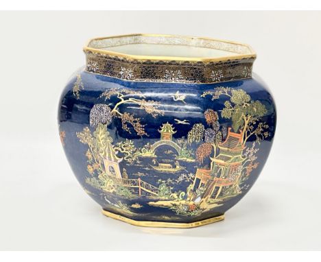 Wiltshaw &amp; Robinson Carlton Ware. C.1920. A New Mikado lustre glaze jardiniere. With embossed hand painted enamel paintwo
