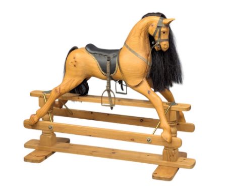 A large good quality Late 20th Century pine rocking horse. 135x110cm