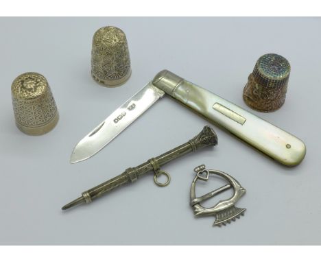 A silver and mother of pearl fruit knife, three thimbles including one Victorian silver, a/f, a pencil and a silver brooch or