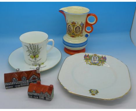 A commemorative Wadeheath jug, a lucky white heather cup and saucer, a Coronation plate, a Goss Shakespeare's house and an Ar