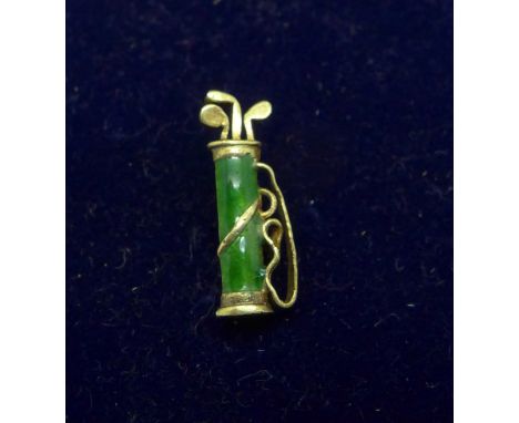 A small 14kt gold and enamel golf bag collar pin