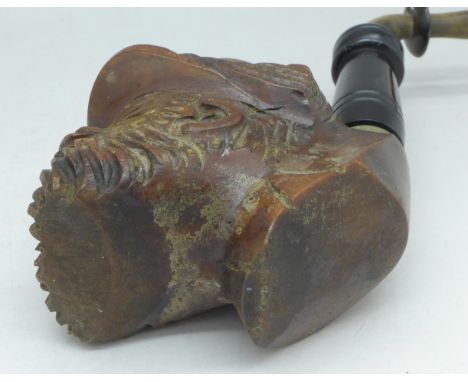 A novelty carved Black Forest type pipe