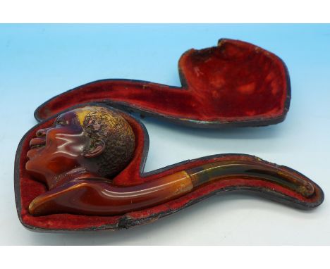A carved pipe with African head bowl, case a/f