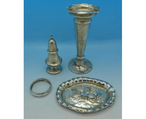 A silver dish, a Victorian silver pepper, a silver vase and a silver napkin ring