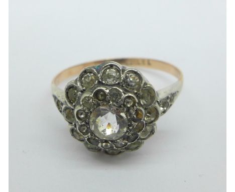 A 9ct gold and silver cluster ring, R