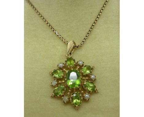 A yellow metal, peridot and pearl pendant with 1980's London mark on a 9ct gold chain, 8.5g