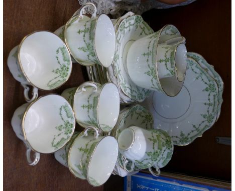 A thirty-four piece Royal Westminster china tea service, ten setting, two cups chipped