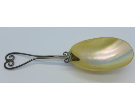 A mother of pearl caviar spoon
