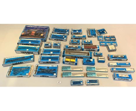 Large box of Marklin boxed track, buildings, coaches, tankers, wagons, signals, cable, lighting kits, controls etc.