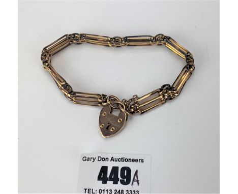 9k rose gold gate bracelet with heart lock, 7” long, w: 13.9 gms