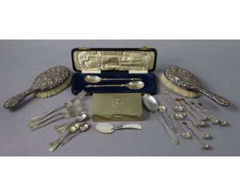 A pair of late Victorian hairbrushes with silver backs embossed with masks &amp; leaf-scrolls, London 1890 (w.a.f.); a pair o