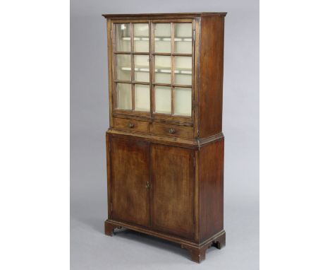 A 19th century inlaid mahogany small cabinet, fitted two shelves to the top, enclosed by pair of glazed panel doors &amp; wit