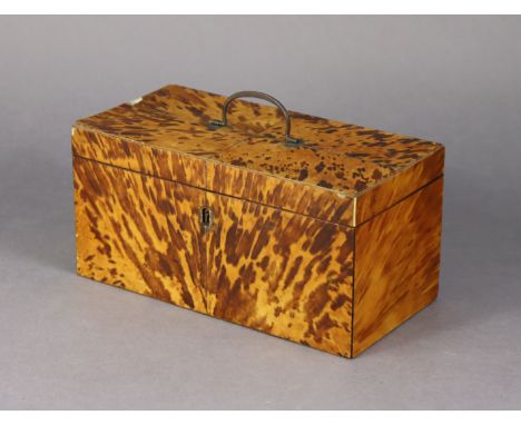 A George III blonde tortoiseshell-veneered rectangular tea caddy with hinged lid enclosing two removable compartments, lackin