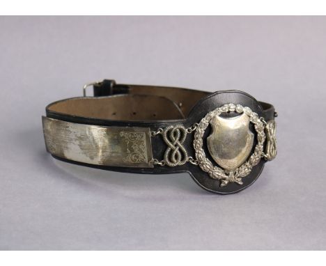 A leather dog collar with George V silver mounts, 21” long, Birmingham 1930 by W.H. Haseler Ltd.
