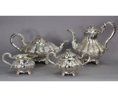 AN ELIZABETH II SILVER FOUR-PIECE TEA &amp; COFFEE SERVICE IN THE EARLY VICTORIAN STYLE, of squat round form with finely chas