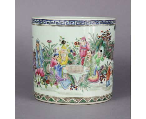 A Chinese famille rose porcelain brush pot, finely painted with scholars &amp; attendants in a landscape, apocryphal Qianlong