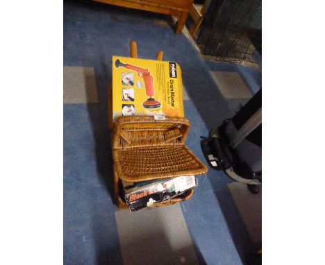 A Wicker Basket Containing Garden Tools Etc 