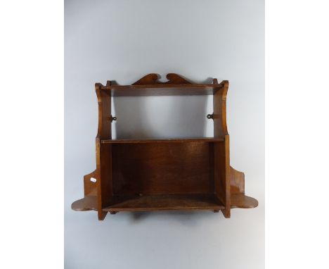 An Edwardian Oak Wall Shelf, 70cm Wide