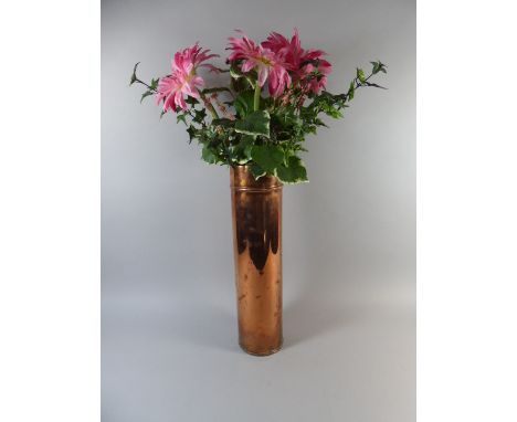 A Copper Cylindrical Stick Stand with Artificial Flowers, 50cm High 