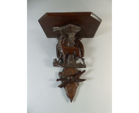 A Carved Oak Black Forest Wall Bracket Decorated with Deer Grazing at Tree, 40cm High
