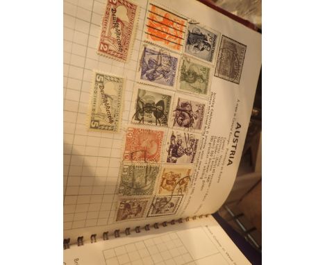 Vintage album with worldwide postage stamp contents