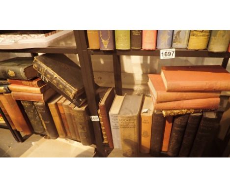 Two shelves of vintage and antiquarian books 