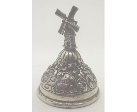 H Hooihkaas early 20thC Dutch silver bell embossed with landscapes on foliate scroll ground, with windmill finial, D: 4.5 cm,