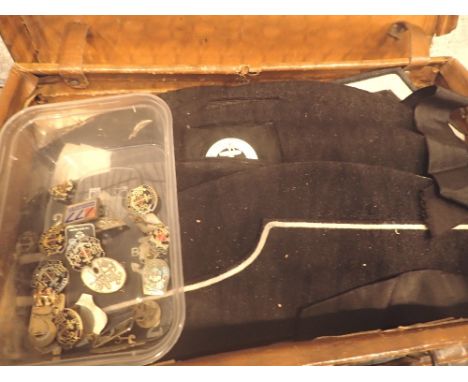 Vintage leather case with Boys Brigade items, including hats and badges