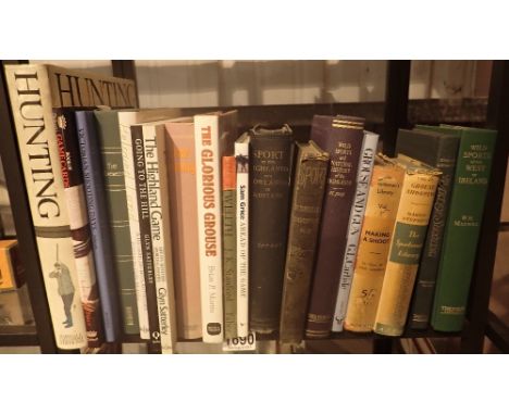 Shelf of books on shooting and guns including grouse 