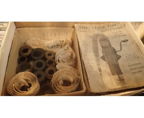 Vintage 'The Cine-Toy' home cinema with films and box