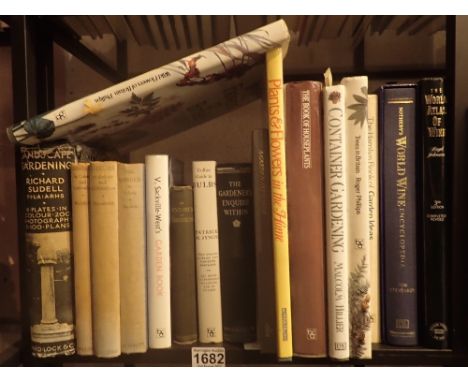 Shelf of gardening and wine books 