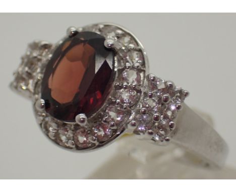 Sterling silver garnet and CZ ring, size T/U