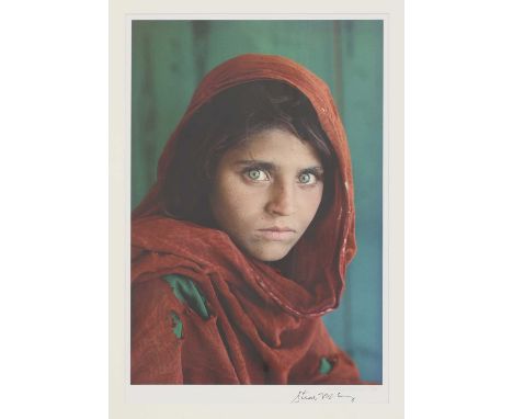 Steve McCurry (American, b.1950)Afghan girloffset lithograph in colours, signed 'Steve McCurry' in pen l.r.image 49.3 x 32.5c