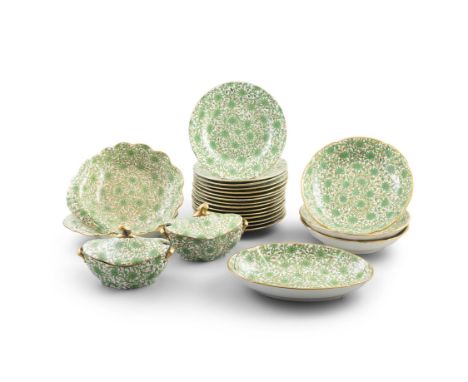 A 19TH CENTURY SPODE CHINA PART DESSERT SERVICEthe off white ground decorated with foliate sprays in gilt and green, comprisi