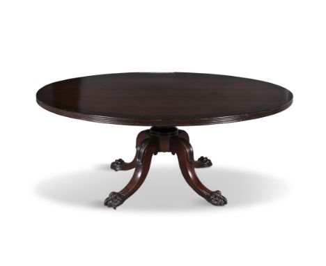 A GEORGE IV MAHOGANY AND CROSSBANDED CIRCULAR BREAKFAST TABLE, the solid top with reeded edge, supported on a turned centre c