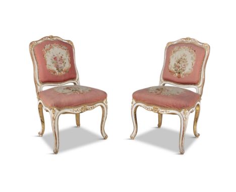 A PAIR 19TH CENTURY LOUIS SEIZE STYLE GILTWOOD FRAMED SIDE CHAIRS, the shaped rectangular panel backs and seats covered in ta