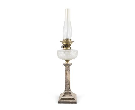 A SILVER AND CUT GLASS OIL LAMP, the reservoir with Messenger No. 2 brass fittings raised on a Corinthian column and stepped 