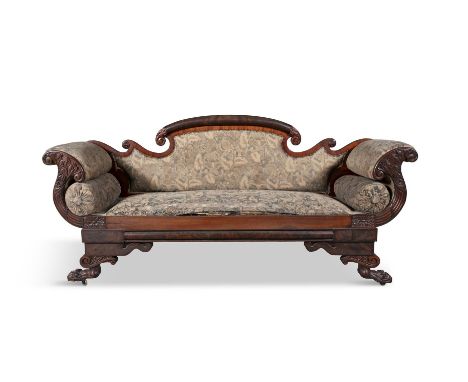 A WILLIAM IV MAHOGANY SCROLL END SETTEE,the domed back and padded seat upholstered in floral and foliate tapestry fabric, the