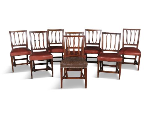 A MATCHED SET OF EIGHT IRISH MAHOGANY FORK BACK DINING CHAIRS, c.1800,seven seats covered in red leather, one in brown
