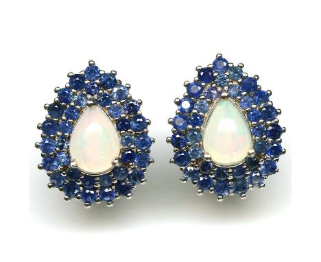 A pair of 925 silver earrings set with cabochon cut opal and two rows of sapphires, L. 2cm.