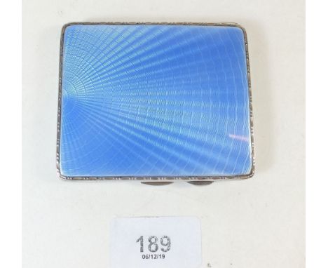 A silver and blue enamel cigarette case, Birmingham 1934, 121g