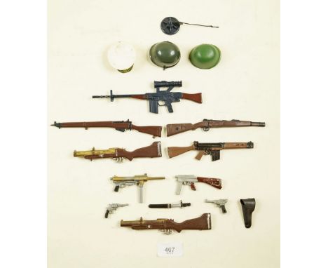 A box of Action Man rifles, helmets etc