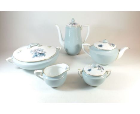 A Royal Worcester part dinner service in the Woodland pattern:- two tureens, teapot, milk, sugar, coffee pot, larger milk and